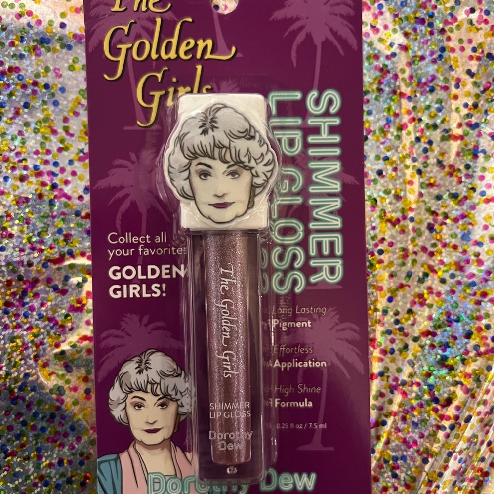 The Golden Girls Shimmer Lip Gloss - Dorothy Dew (Pink Plum)